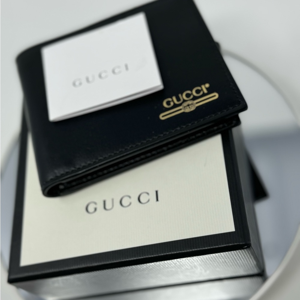 Gucci Black Leather Gold Embossed GG Logo Bifold Wallet. $460 - Picture 3 of 6